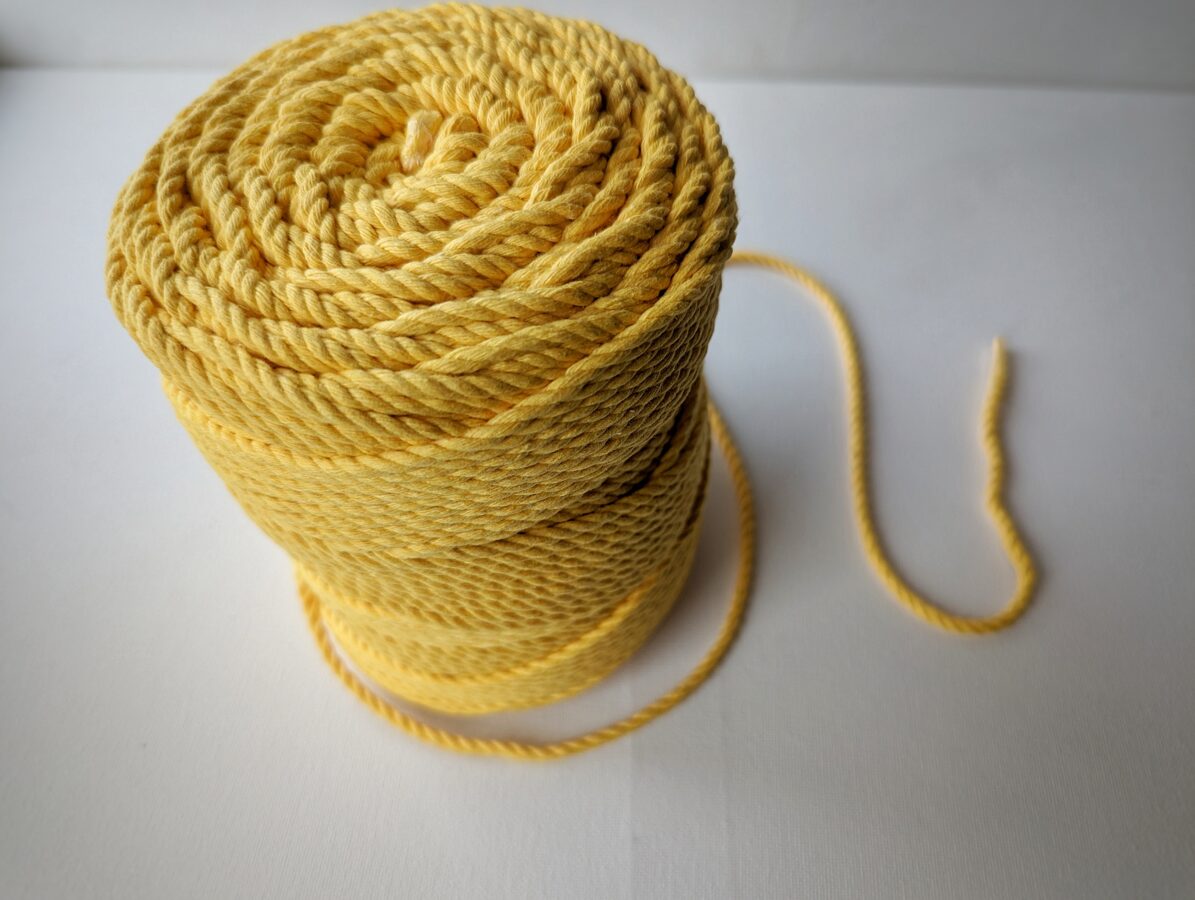 Three-ply cotton cord. Yellow
