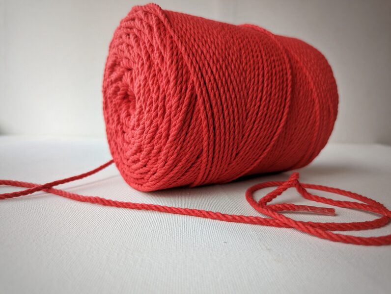 Three-ply cotton cord. Bright red